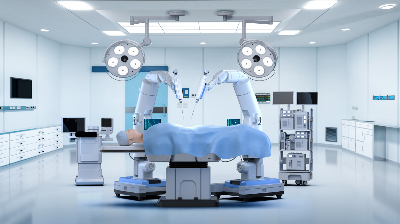 Surgical robotic system with two robotic arms over a patient on an operating table in a bright OR (no start of image).