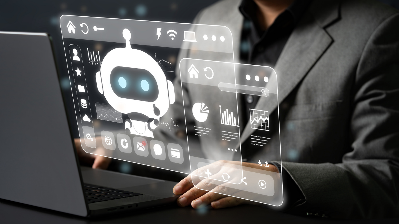 Person at a laptop with a floating holographic dashboard showing a robot avatar, charts, and icons (tech/concept image).